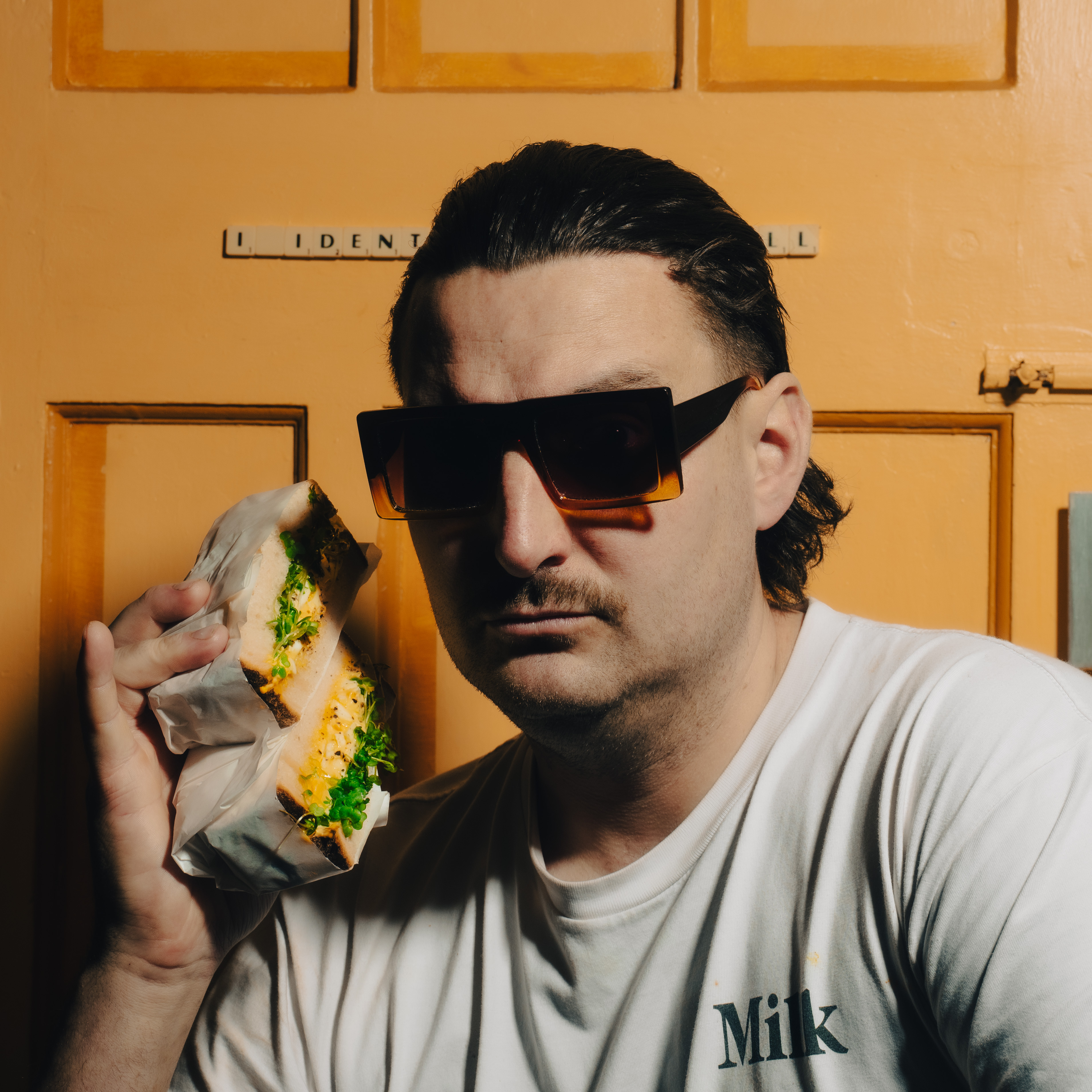 Chef preparing sandwiches at Sabins